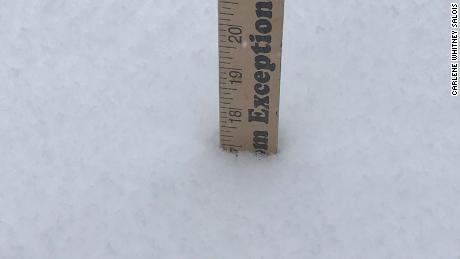 Carlene Whitney Salois took pictures of a ruler in the snow during a storm in Montana. 