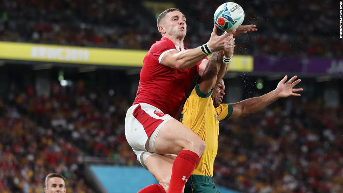 George North of Wales and Kurtley Beale of Australia jump for the ball in the Tokyo Stadium.