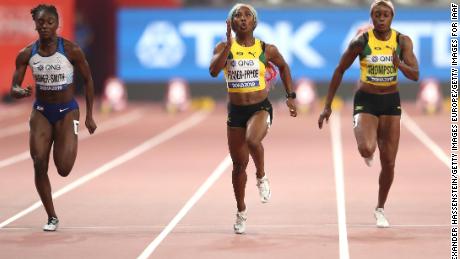 Fraser-Pryce held off the challenge of Britain&#39;s Dina Asher-Smith (L)