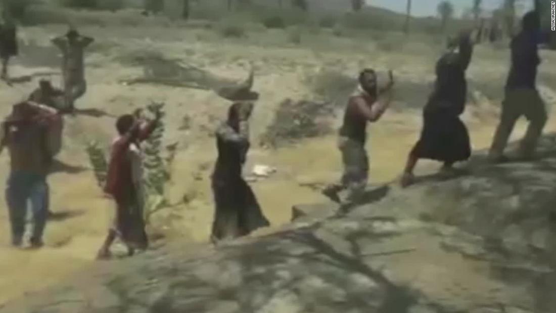 A screengrab from footage via Houthi-run Al Masirah TV purportedly shows soldiers surrendering to Houthi rebels near the Saudi Arabia-Yemen border.