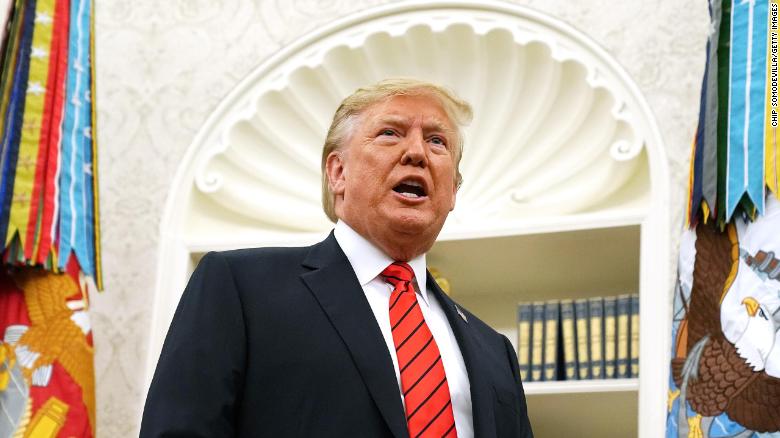 President Donald Trump gives pauses to answer a reporters&#39; question about a whistleblower as he leaves the Oval Office after hosting the ceremonial swearing in of Labor Secretary Eugene Scalia at the White House September 30, 2019 in Washington, DC. 