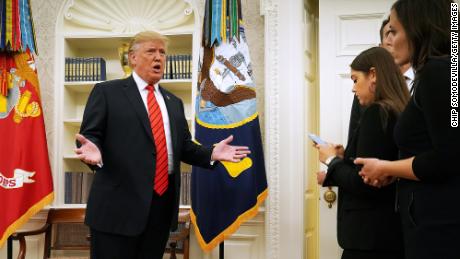 WASHINGTON, DC - SEPTEMBER 30: U.S. President Donald Trump gives pauses to answer a reporters&#39; question about a whistleblower as he leaves the Oval Office after hosting the ceremonial swearing in of Labor Secretary Eugene Scalia at the White House September 30, 2019 in Washington, DC. Scalia was nominated by Trump to lead the Labor Department after Alex Acosta resigned under criticism over a plea deal he reached with Jeffrey Epstein. (Photo by Chip Somodevilla/Getty Images)