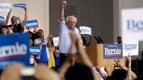 sanders supporters joining hands