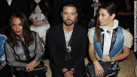 Justin Timberlake was grabbed by a prankster at Paris Fashion Week 