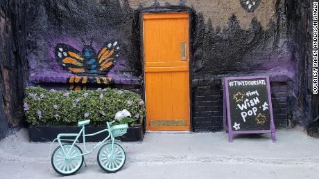 This tiny door in Atlanta&#39;s Inman Park neighborhood can be found near King of Pops, a popsicle shop. It can take Karen Singer 40 hours or more to create a single door.