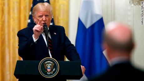 A defiant President Donald Trump speaks during a news conference at the White House on October 2. 