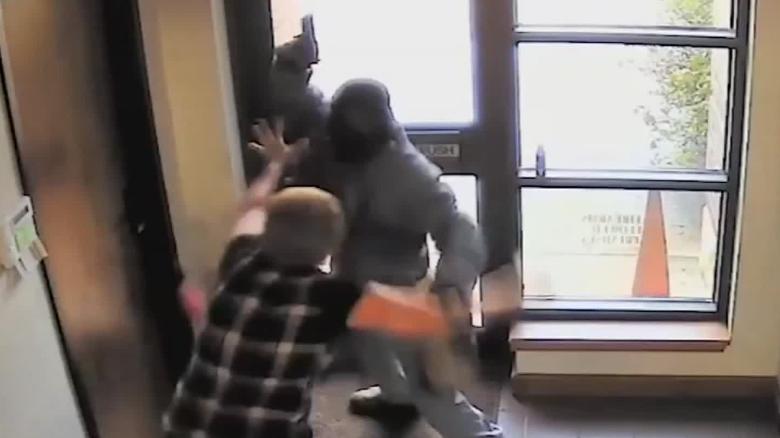 A 60-year-old woman fought off an armed bank robber