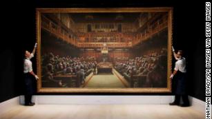 Banksy&#39;s &#39;Devolved Parliament&#39; sells at auction for $12.2 million