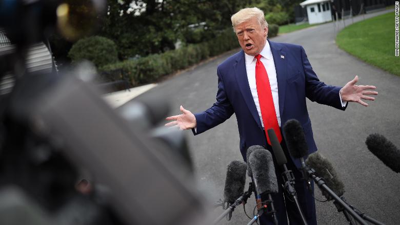 U.S. President Donald Trump answers questions while departing the White House on October 03, 2019 in Washington, DC.