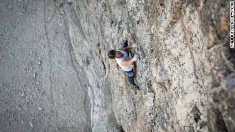 Arnold climbed the same route three times with ropes before attempting the free solo. 
