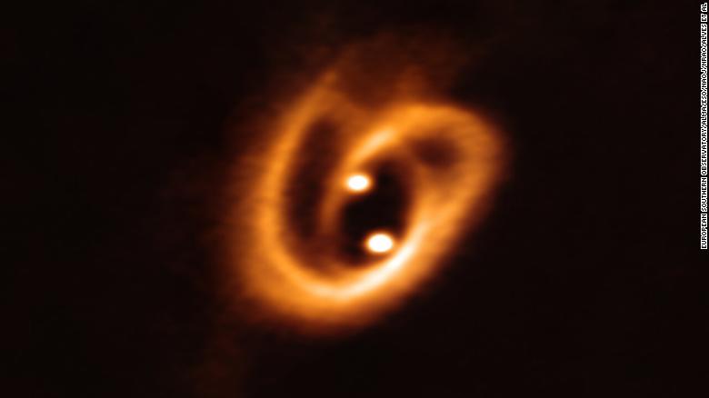 The Atacama Large Millimeter/submillimeter Array captured this unprecedented image of two circumstellar disks, in which baby stars are growing, feeding off material from their surrounding birth disk. 