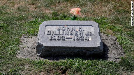 The headstone of John Dillinger is seen at Crown Hill Cemetery, Thursday, Aug. 1, 2019, in Indianapolis.