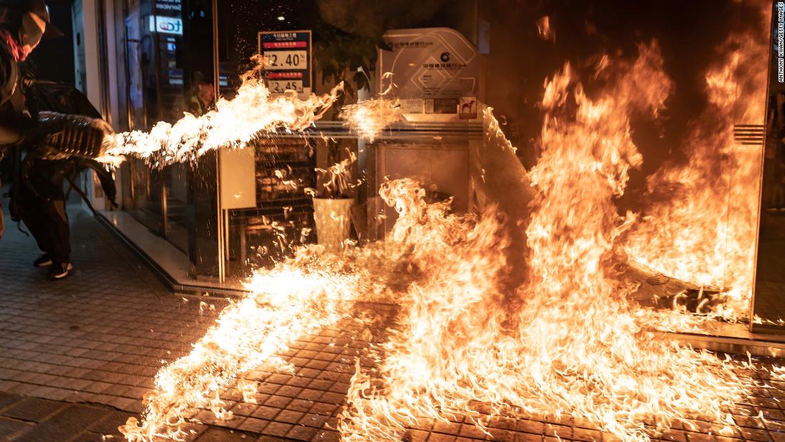 Protesters set a fire at a China Construction Bank.