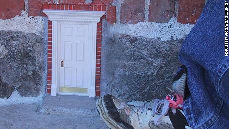 The first public fairy door was placed outside Sweetwaters Coffee and Tea in downtown Ann Arbor in April 2005.