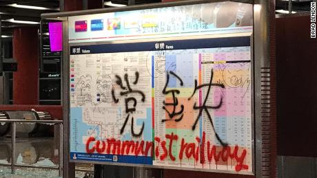 Anti-government graffiti scrawled on a sign at Hong Kong&#39;s Tseung Kwan O MTR station, Friday, October 4.