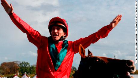 French jockey Pierre-Charles Boudot celebrates his victory on Waldgeist in the 2019 Qatar Prix de l&#39;Arc de Triomphe.