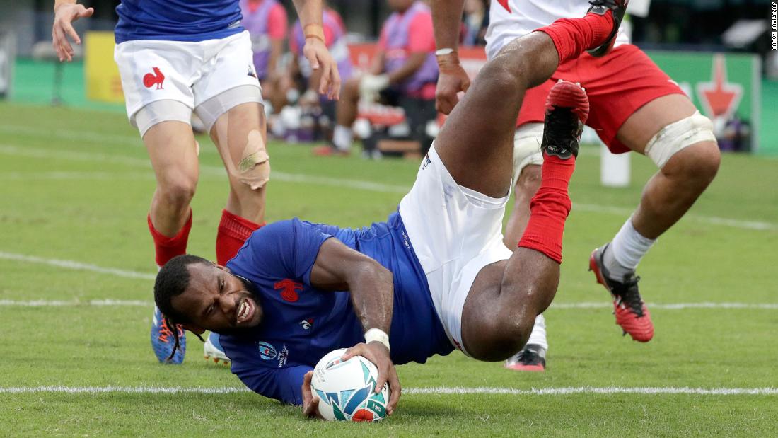 France&#39;s Alivereti Raka touches the ball down to score an early try against Tonga in his side&#39;s narrow 23-21 win in Pool C.