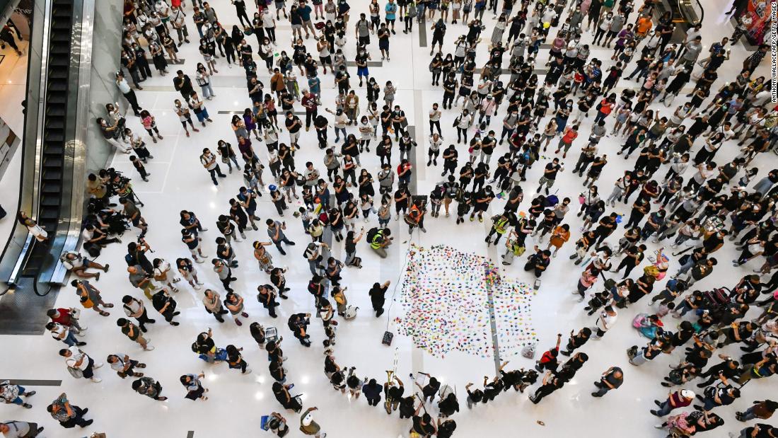 Pro-democracy protesters gather in a shopping mall on October 7.