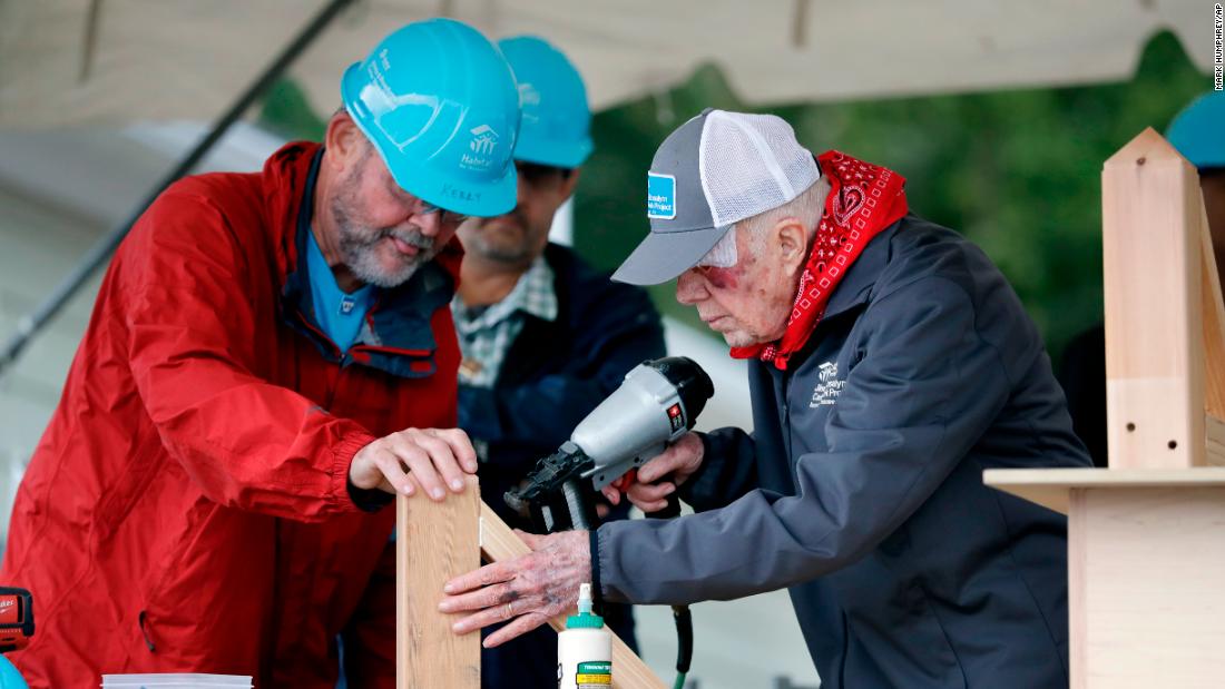 Despite 14 stitches and a black eye, Jimmy Carter is back building