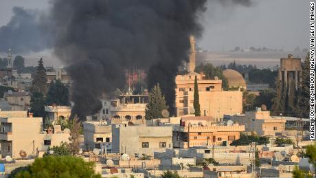 SANLIURFA, TURKEY - OCTOBER 09: A photo taken from Turkey's Sanliurfa province, on October 09, 2019 shows smoke rises at the site of Ras al-Ayn city of Syria as Turkish troops along with the Syrian National Army begin Operation Peace Spring in northern Syria against PKK/YPG, Daesh terrorists. (Photo by Kerem Kocalar/Anadolu Agency via Getty Images)