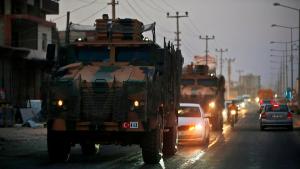 Shortly after the Turkish operation inside Syria had started, a convoy of Turkish forces vehicles is driven through the town of Akcakale, Sanliurfa province, southeastern Turkey, at the border between Turkey and Syria, Wednesday, Oct. 9, 2019. Turkey launched a military operation Wednesday against Kurdish fighters in northeastern Syria after U.S. forces pulled back from the area, with a series of airstrikes hitting a town on Syria's northern border. (AP Photo/Lefteris Pitarakis)