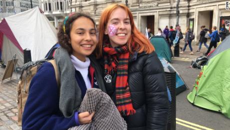 Annabelle van Dort (left) is taking part in the demonstrations with her housemate Olwen Collins. 