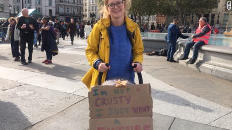 A mother from south London takes part in Extinction Rebellion&#39;s others&#39; march.