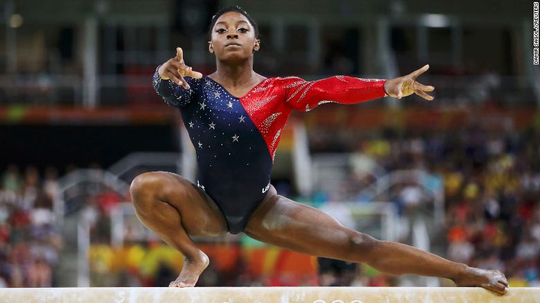 Biles competes on the balance beam at the 2016 Olympics in Rio de Janeiro.