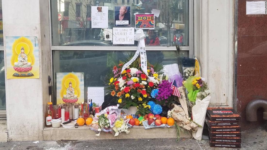 A stack of hot pizza boxes left by Akdeniz from his pizza restaurant at a memorial.