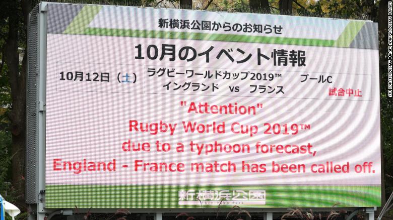  A sign outside of the Yokohama Stadium informs of the cancellation of the England v France game. The game between Japan and Scotland at the same venue remains in doubt.