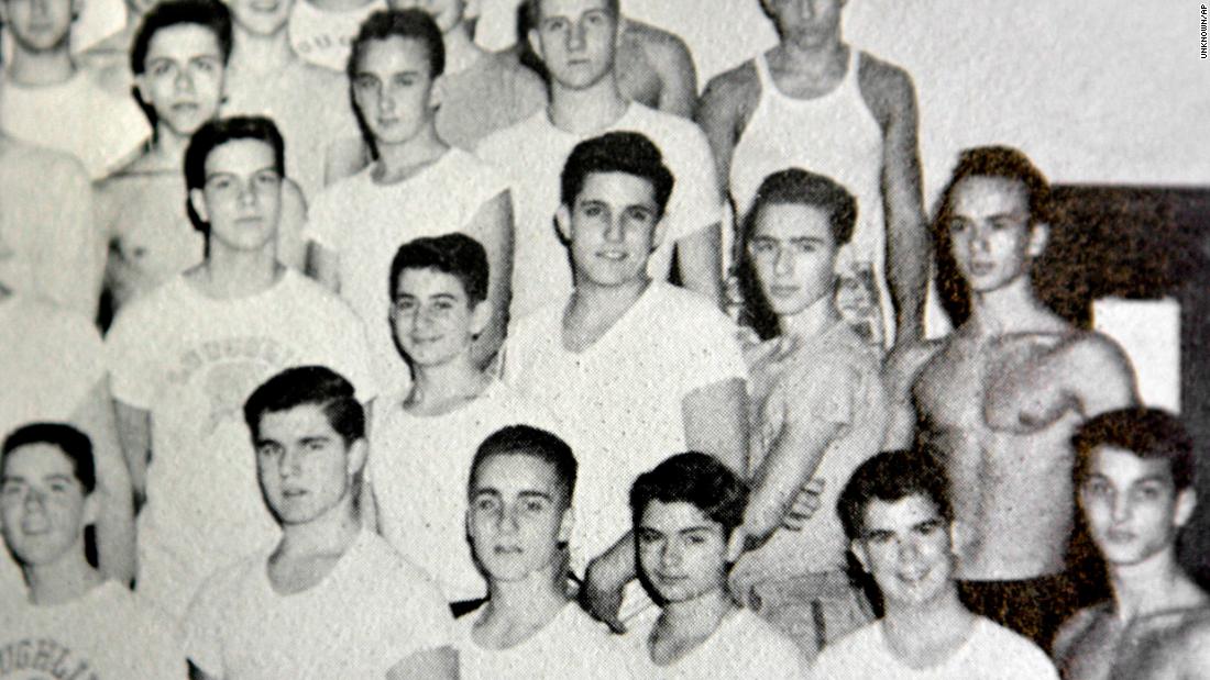 A young Giuliani is seen in the second row, third from right, in this high school yearbook photo from 1960. Giuliani is posing with other members of the weightlifting team at New York&#39;s Bishop Loughlin Memorial High School.