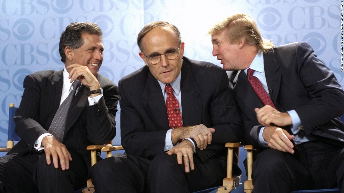 Giuliani is flanked by CBS President Les Moonves, left, and Donald Trump at a news conference in May 1999. CBS was announcing that Bryant Gumbel would be the host of a new morning news program that would air from Trump&#39;s International Plaza Building.