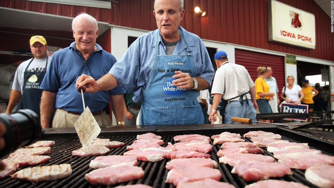 Giuliani cooks pork at the Iowa State Fair while campaigning for president in August 2007.