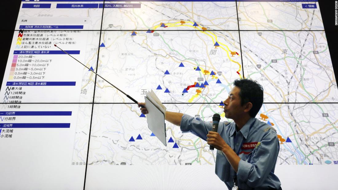 A land ministry official explains effects of Typhoon Hagibis on rivers in Saitama Prefecture during a press conference in Saitama city, near Tokyo, on October 12.