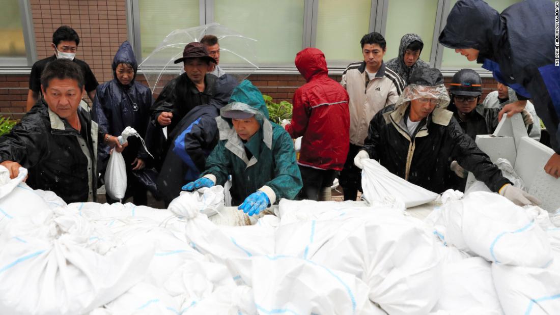 Residents collect sandbags as Typhoon Hagibis approaches Tokyo, Japan on October 12.