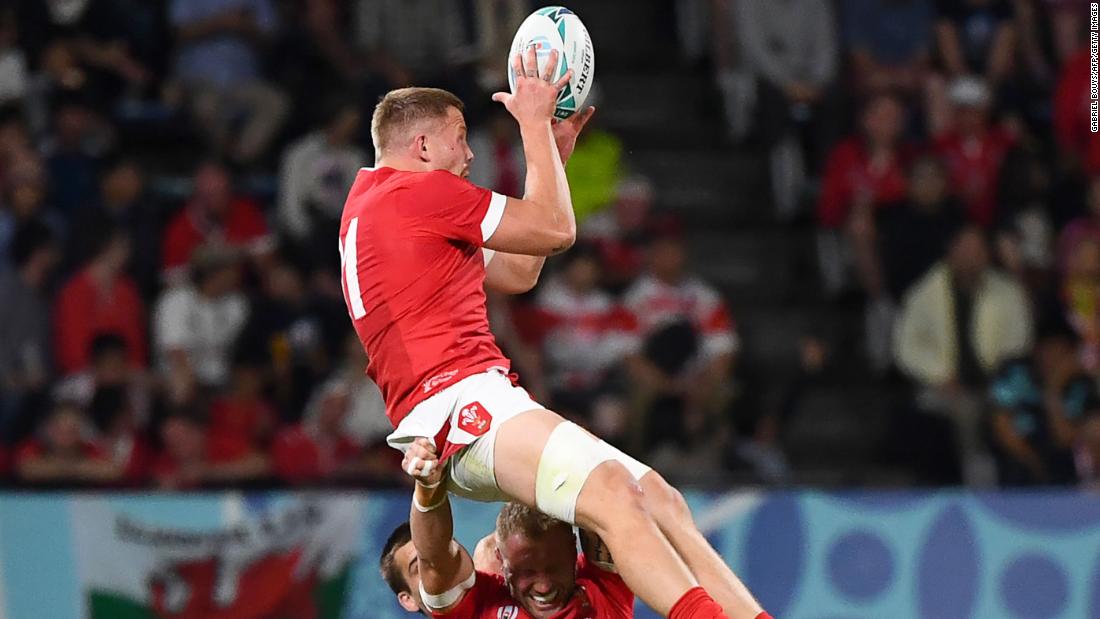 Wales&#39; back row James Davies catches the ball above back row Ross Moriarty during the Pool D match between Wales and Uruguay at the Kumamoto Stadium in Kumamoto, Japan, on Sunday.