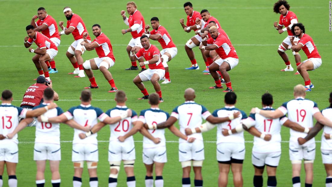 The Tonga players perform the Sipi Tau prior to the Group C game between USA and Tonga at Hanazono Rugby Stadium in Osaka, Japan on Sunday.