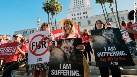 Margo Paine, center, joins protesters with People for the Ethical Treatment of Animals (PETA) in Los Angeles on September 18, 2018.