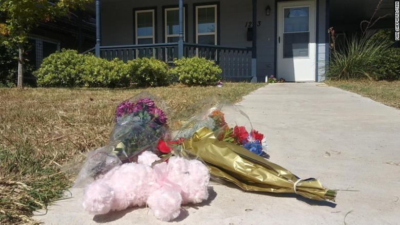 Mourners left flowers in front of the house where 28-year-old Atatiana Jefferson was killed. 