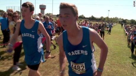 Caleb Freeman, right, completed his first race on Tuesday since a 2017 accident that left him with a traumatic brain injury.