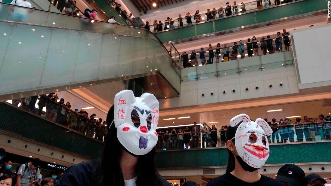 Protesters wearing masks in defiance of &lt;a href=&quot;https://www.cnn.com/2019/10/04/asia/hong-kong-face-mask-ban-meeting-intl-hnk/index.html&quot; target=&quot;_blank&quot;&gt;a recently imposed ban&lt;/a&gt; gather at a shopping mall on October 13.