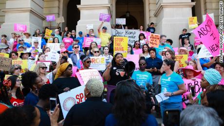 Protestors demonstrated against a Georgia law that would ban abortion as early as six weeks into a pregnancy, when a fetal heartbeat is detected. In early October, a federal judge temporarily blocked the law from taking effect.