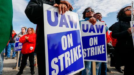 FLINT, MI - OCTOBER 13: United Auto Workers union members and their families rally near the General Motors Flint Assembly plant on Solidarity Sunday on October 13, 2019 in Flint, Michigan. The UAW strike of GM enters its fifth week at midnight tonight, the union&#39;s longest national strike since 1970. The strike by approximately 50,000 UAW members has caused the shut down of 33 manufacturing plants. (Photo by Bill Pugliano/Getty Images)