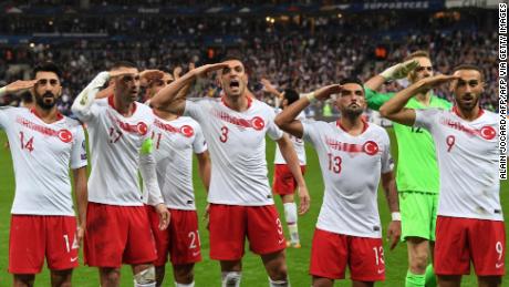 Turkish players salute during the Euro 2020 qualifier against France.