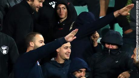 Bulgarian fans perform Nazi salutes against England.