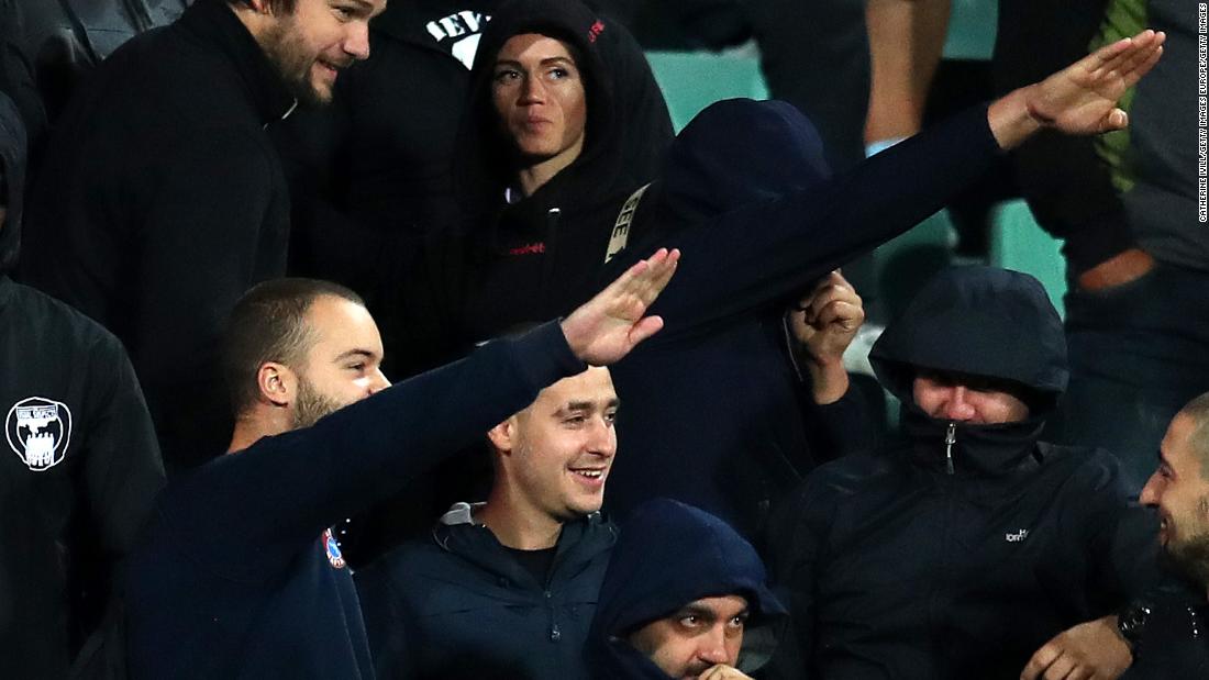 Bulgarian fans perform Nazi salutes against England.