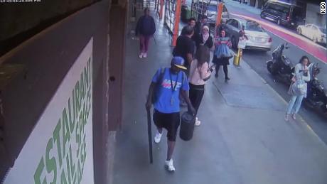 Surveillance video shows a man walking away with the etching.