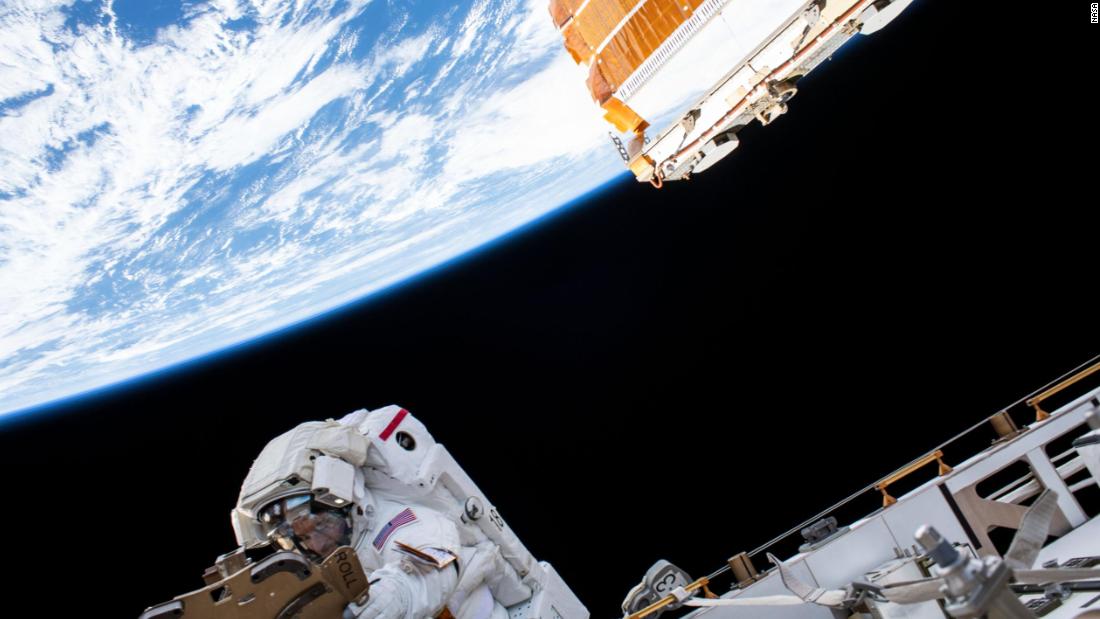 NASA astronaut Andrew Morgan views Earth from 250 miles away during a spacewalk at the International Space Station, an orbiting space laboratory, assembled through a decades-long collaboration of countries.