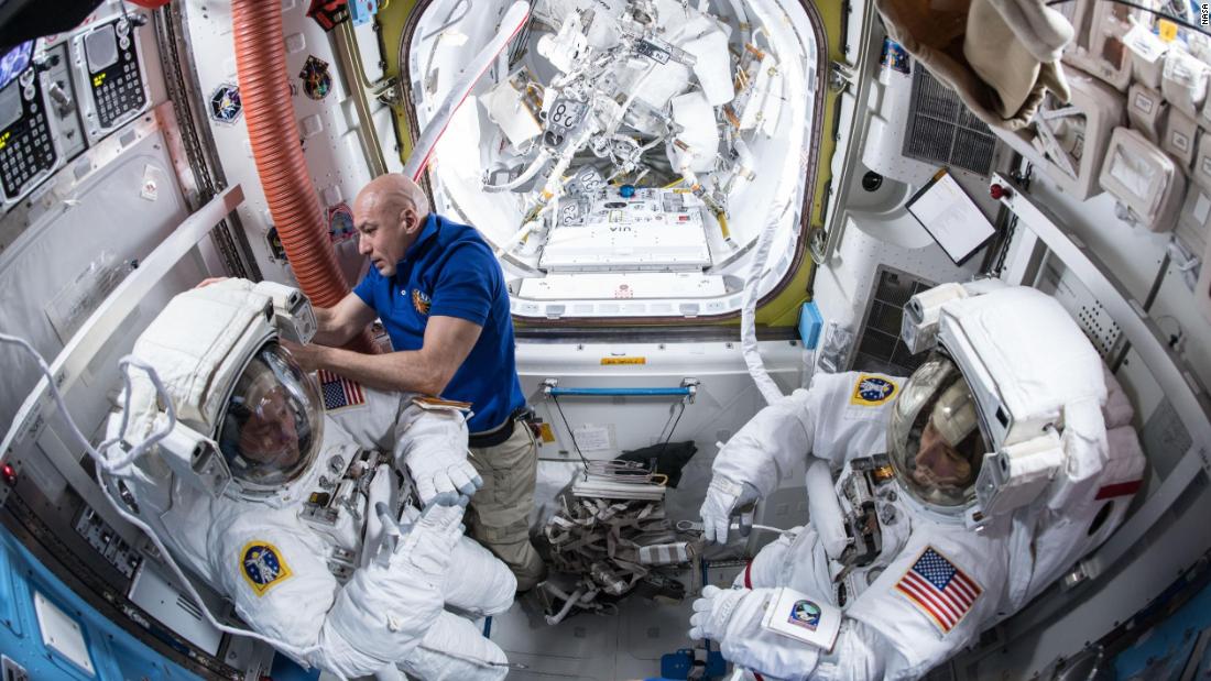 NASA spacewalkers prepare for a seven hour and one minute spacewalk during which they upgraded the station&#39;s batteries to newer, more powerful lithium-ion batteries.