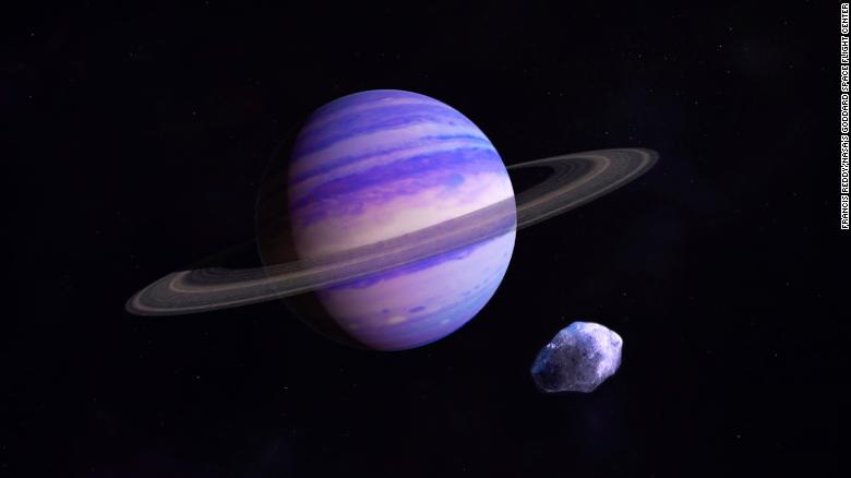 This is an artist's illustration of a Neptune-type exoplanet in the icy outer reaches of its star system. It could look something like a large, newly discovered gas giant that takes about 20 years to orbit a star 11 light years away from Earth.